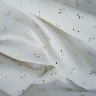 double gaze de coton blanc imprimée étincelles dorées certifiée Oeko-Tex idéale pour créer des vêtements légers