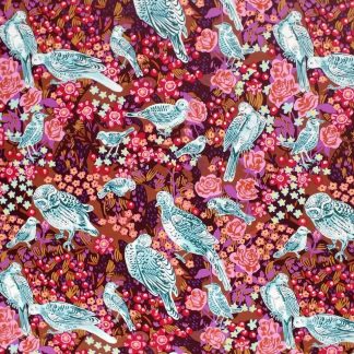 tissus imprimés mon jardin de Nathalie Lété pour Free Spirit oiseaux dessinés au trait blanc et bleu canard sur un fond coloré travaillé dans les couleurs chaudes et colorée rouge rose violine
