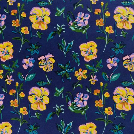 tissu imprimé floral mon jardin de Nathalie Lété des pensées jaunes aux reflets roses et mauves sur un fond bleu marine