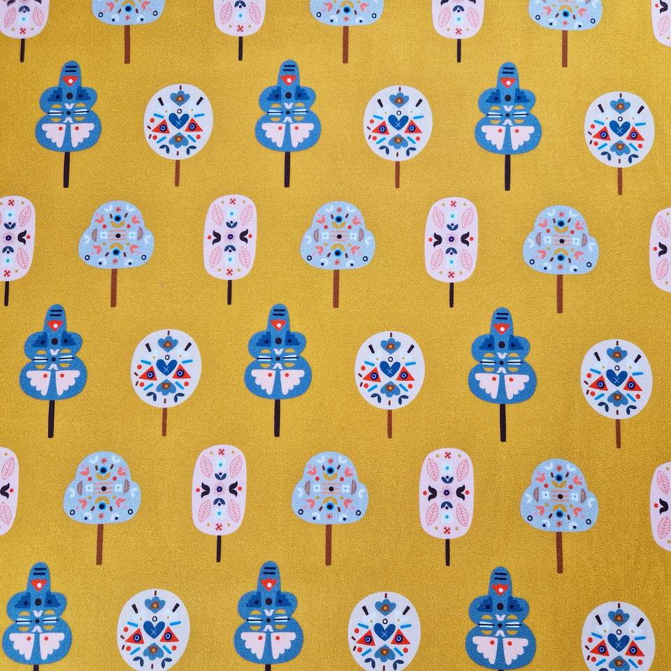 Tissu coton imprimé arbres Dashwood studio Nordiska arbres stylisé couleurs pastels sur fond beige ocre jaune