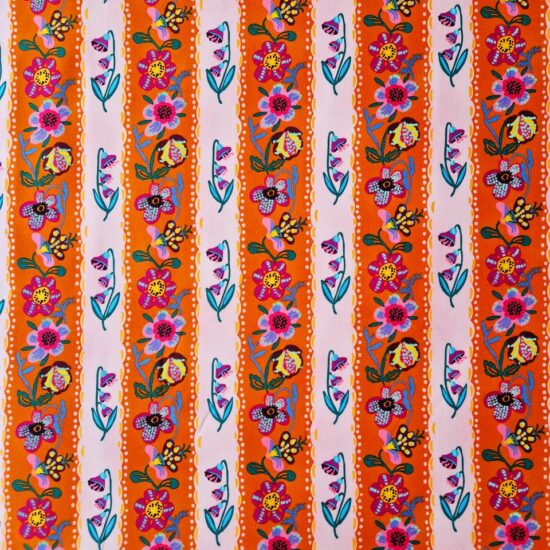 Tissu en coton imprimé rayures de fleurs le fond est orange et mauve joyeux coloré