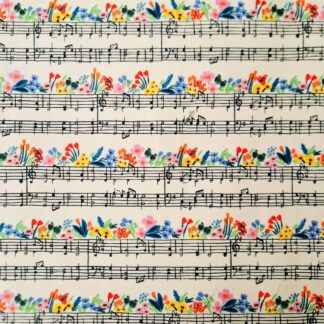 Tissu coton imprimé Rifle Paper Co motif floral coloré sur des portée de notes de musique poétique et joyeux