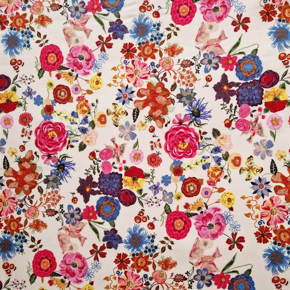 Tissu coton imprimé Free Spirit Nathalie Lété motif floral Folk Dream joyeux coloré des fleurs roses bleues sur un fond pêche clair
